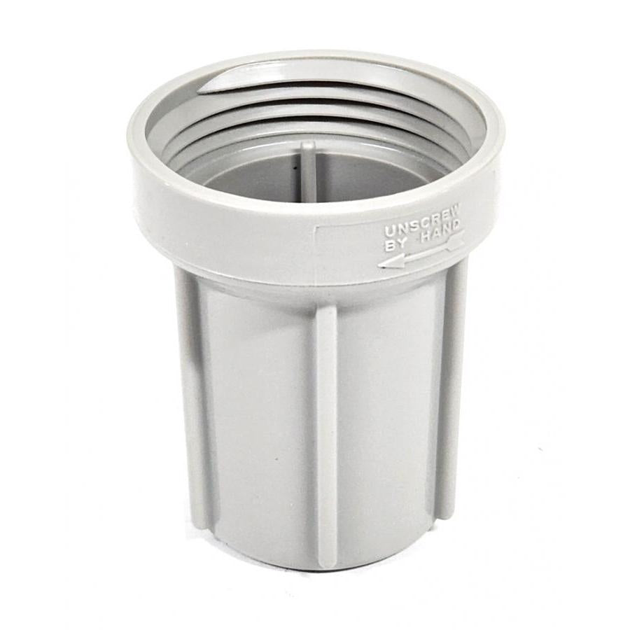 Grey plastic threaded pipe fitting with vertical ribs and Unscrew By Hand text, isolated on a white background.