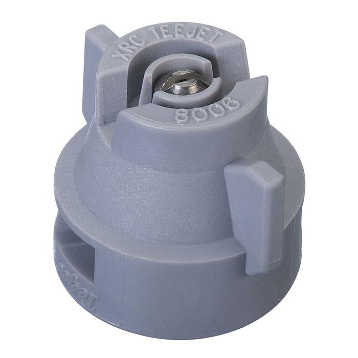 Grey TeeJet XRC11006-VS extended range flat spray nozzle with a stainless steel insert for agricultural precision.