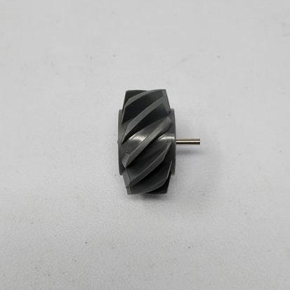 Grey plastic helical gear with a metal shaft center, viewed from the side on a light grey background.