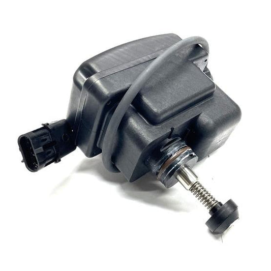 Black plastic automotive actuator with a metal spring-loaded plunger and an integrated electrical connector.