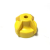Small yellow plastic cap with a central hole and reinforced ribbed design for secure industrial fastening.