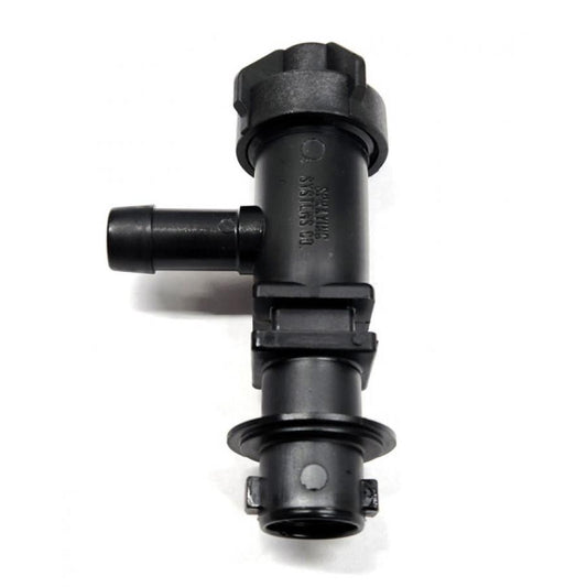Black plastic Spraying Systems Co. nozzle body with a side hose barb and threaded cap connection.
