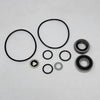 Hypro hydraulic motor seal kit containing black rubber O-rings, metal washers, and two steel ball bearings on white.