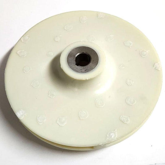 Off-white Valox pump impeller with a centered metal keyed shaft hub on a white background.